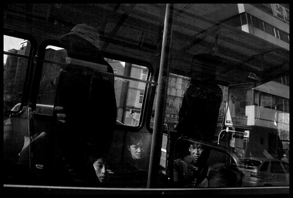 People get on a bus in Kunming, Yunnan, China.
