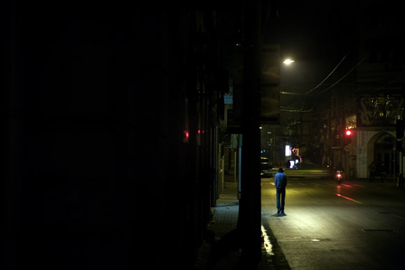 People walk along the streets and alleys around Nanjing East Road in central Shanghai, China.