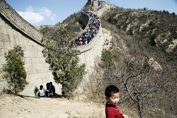 Tourists ascend the Great Wall at Badaling outside of Beijing, China.