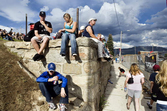Crowds gather on a hillside to watch a motorcycle performance during Evel Knievel Days in Butte, Montana, USA.