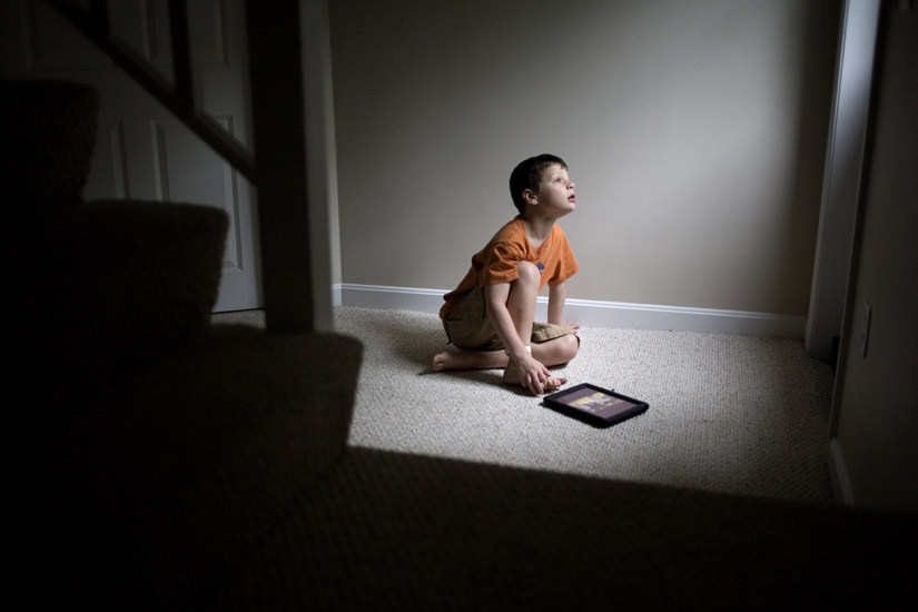 Jack, age 7 and autistic, uses iPad for education